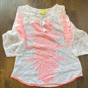 White shirt with pink embroidery. New with tags.